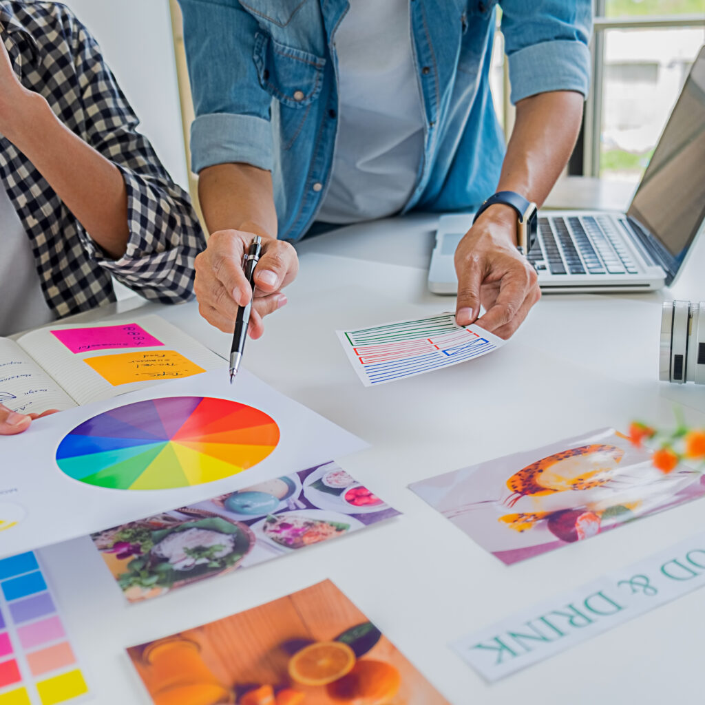 Team of designers working with colours