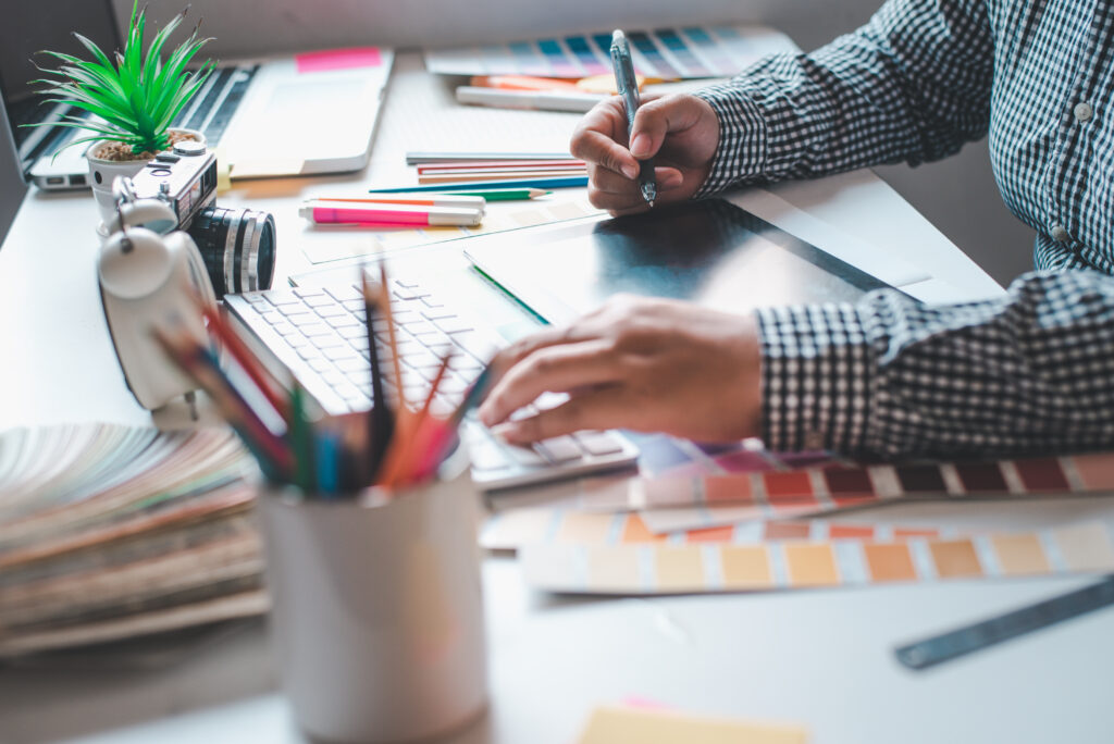 A designer working with colours at a branding agency or creative agency.