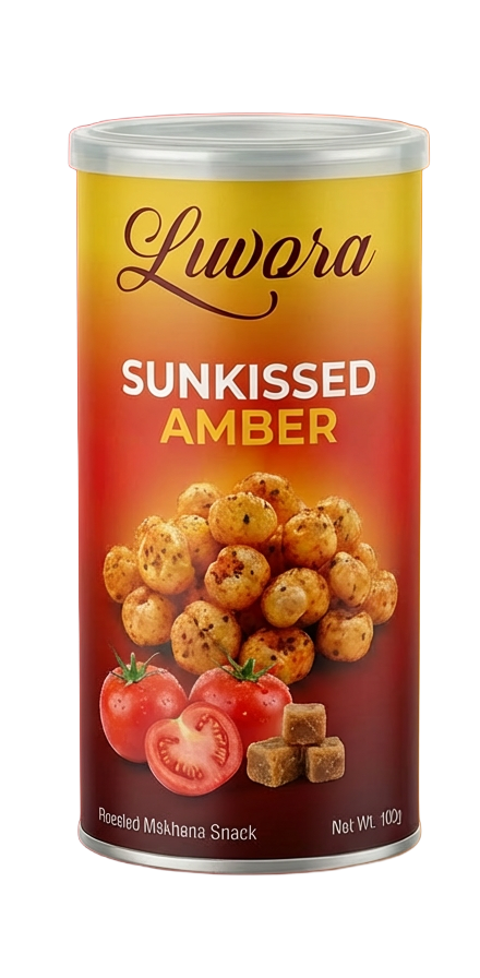 Can of Luvara Sunkissed Amber snack with a yellow‑to‑red gradient label, showing round puffed bites and tomatoes on the lower half of the can.